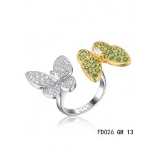 Prsten Van Cleef Arpels Two Butterfly Between The Finger ze žlutého zlata s tsavority a granáty.